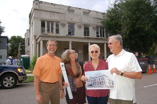 From left, architects Bill and Melody Bishop with JoAnn Tredennick and Jack Meeks, developers of the Elena Flats historic restoration project, outside the Downtown property.