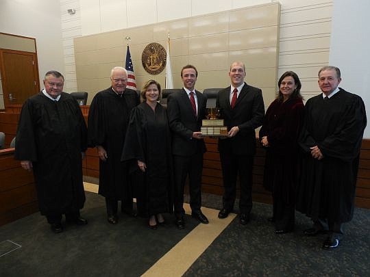 The University of Georgia team won the annual Florida/Georgia Hulsey/Gambrell Moot Court Competition on Friday. From left are Senior Judge William Terrell Hodges, Middle District of Florida; Judge Gerald B. Tjoflat, 11th Circuit Court of Appeals; Judg...