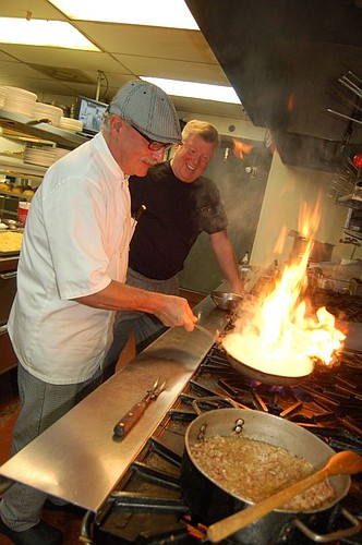 Sous chef Michael Jablonski, left, and Jerry Moran, owner and executive chef, are heating it up at La Cena Ristorante Downtown. Jablonski is a former executive chef at Epping Forest Yacht & Country Club.
