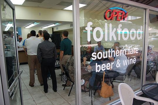 Folkfood, Downtown's newest lunch and dinner restaurant, opened Wednesday at 219 Hogan St. It originated from a food truck.