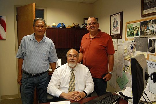 From left, U.S. Navy veteran Reynaldo Carangian, Veterans Service Officer Supervisor Rafael Santiago and Navy veteran Samuel Santiago.