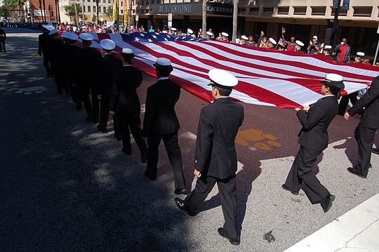 A huge American flag was carried near the front of the annual Veterans Day parade Wednesday in Downtown.