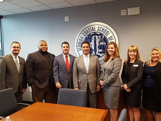Florida Bar President Ramon Abadin, center, and President-elect Bill Schifino, third from left, visited with Florida Coastal School of Law students and faculty last week. From left are Nathan Watters, David Brown, Katherine Hurst-Miller, Amanda Lynch ...