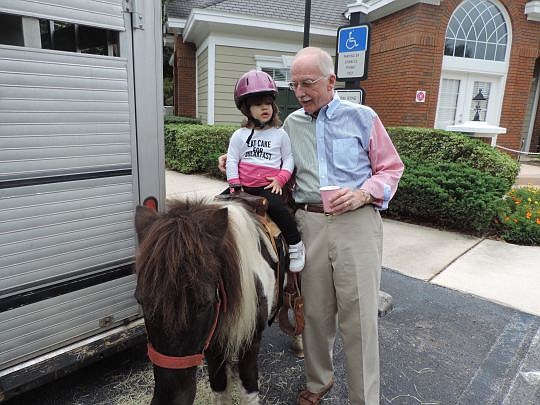 Mike Hightower and his granddaughter, Gracie.