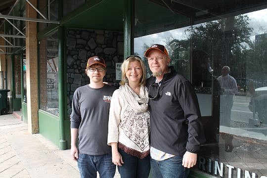 Bold City Brewery will open a small craft brewery and taproom Downtown next to the Cowford Chophouse. The Downtown location will add exposure for Riverside-based company, co-owner Susan Miller said. Pictured with Miller are her sons, Kevin Miller, lef...