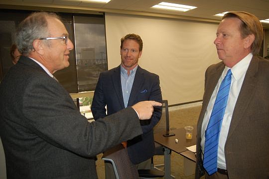 From left, Jacksonville Aviation Authority CEO Steven Grossman, JAX Chamber President Daniel Davis and John Delaney, University of North Florida president and chamber chair, discuss truJAX, the new campaign designed to change how the community views i...
