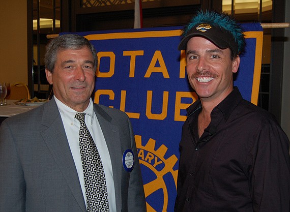 Photos by Max Marbut - Program Committee Chairman Jim Bailey, who publishes the Daily Record, introduced Curtis Dvorak, Jacksonville Jaguars mascot coordinator, at Monday's meeting of the Rotary Club of Jacksonville.