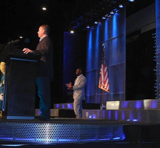Photos by David Chapman and Karen Brune Mathis - Jacksonville Jaguars quarterback David Garrard was introduced by announcer Brian Sexton to more than 1,500 people Tuesday at the Jacksonville Regional Chamber of Commerce Kickoff Luncheon at the Osborn ...