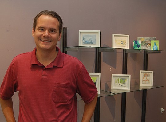 Photo by Max Marbut - Architect John Allmand has opened an office and art gallery in the Elks Building on Laura Street.