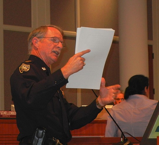 Photos by Karen Brune Mathis - Sheriff John Rutherford was provided more than the allotted three minutes of public speaking time Tuesday to ask City Council members to restore the funding the Council proposes to eliminate. "We cut as deep to the bone ...