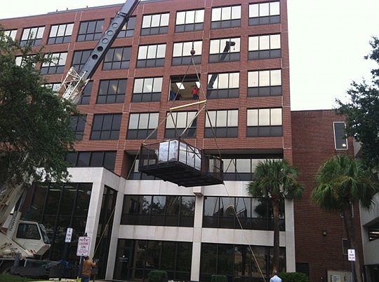 St. Vincent's Medical Center hoisted three hyperbaric oxygen therapy chambers to the fifth floor of the Dillon building for its Wound Care Center, which will start offering treatments in October.