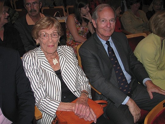 Photos by Joe Wilhelm Jr. - Betty Poucher and son-in-law Steve Reynolds settle in at the Phillips Center for the Performing Arts Sept. 12 at the University of Florida for the first installment of the Allen L. Poucher Legal Education Series. Betty Pouc...