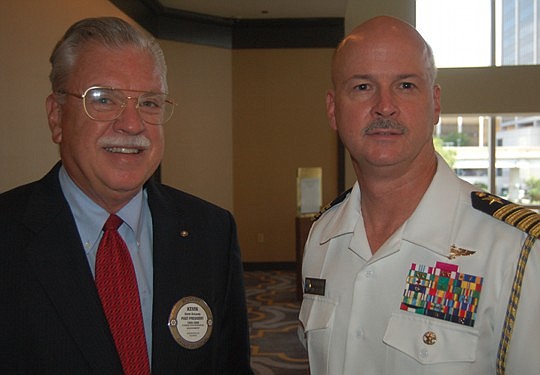 Photos by Max Marbut - Rotary Club of Jacksonville Past President and retired U.S. Navy Adm. Kevin Delaney and U.S. Navy Capt. Steven Blaisdell, who was the guest speaker at the club's meeting Monday at the Omni Downtown.