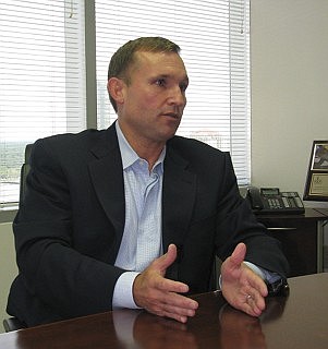 Photo by Karen Brune Mathis - Curry at his offices in the SunTrust Tower Downtown.