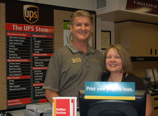 Photo by Max Marbut - Terry and Vikki Wilkins will celebrate their 8th anniversary in business Downtown next month.