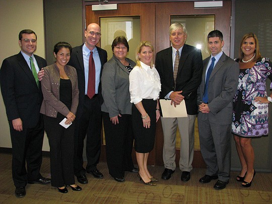 Photos by Joe Wilhelm Jr. - The Hispanic Bar Association of Northeast Florida and The JBA Young Lawyers Section hosted "The Showdown that was the NFL Lockout" Thursday. It was a CLE that discussed the labor law involved in the NFL lockout. Pictured fr...