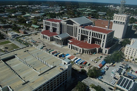 Photo by Max Marbut - The proposed Monroe Street restoration would construct a road between the front of the new Duval County Courthouse and Adams Street, which is along the parking garage in the lower left of the photo above. The restored portion of ...