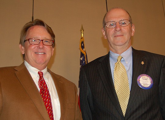 Photo by Max Marbut - University of North Florida President John Delaney (left) and Pierre Allaire, UNF vice president for institutional advancement.