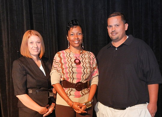 Photos by Karen Brune Mathis - Karrie Adkins, Theresa Goff and Donovan Parker were honored by Goodwill as the 2011 Achievers Of The Year.  All three sought help at Goodwill and overcame obstacles. Adkins has worked her way up to become manager of the ...