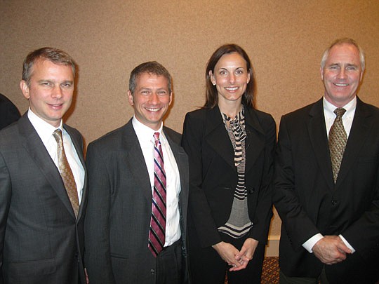 Photo by David Chapman - A JAX USA regional economic development panel (from left) Chris Engle, senior consultant at Avalanche Consulting; Joel Simon, associate vice president for public sector services at the Council for Adult &amp; Experimental Lear...