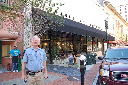 Photos by Max Marbut - Ron Chamblin, owner of Chamblin's Uptown, is redesigning the front of his Laura Street bookstore and cafÃ© with the help of Downtown Vision Inc.'s Laura Street FaÃ§ade Grant Program.