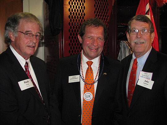 Photos by Joe Wilhelm Jr. - Hank Coxe, former president of The Florida Bar and The Jacksonville Bar Association, with Fred Leonhardt of GrayRobinson and Jake Schickel, a former member of The Florida Bar board of governors, at GrayRobinson's annual "Co...
