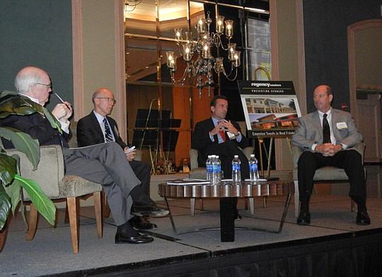 Photos by Karen Brune Mathis - Urban Land Institute Chair Peter Rummell and panelists Charles Carlisle, Eric Zimmermann and Jerry Mallot.