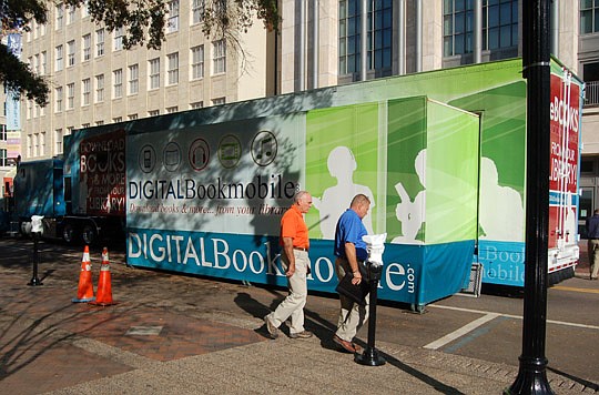 Photos by Max Marbut - Laura Street in front of the Main Library and the Museum of Contemporary Art was closed Wednesday for the "Digital Bookmobile," which is on a national tour to promote the latest way to borrow a book from the Jacksonville Public ...