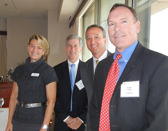 Photos by Karen Brune Mathis - Panelist Debbie Buckland with SunTrust, moderator Chuck Hedrick with Foley &amp; Lardner, and panelists John Willis of PNC Business Credit and Curt Cunkle of EverBank.