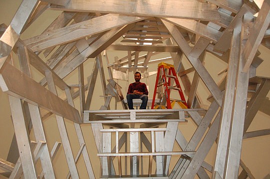 Photos by Max Marbut - Sculptor Gustavo Godoy installed and then sat inside "Empty Altar/Empty Throne" this week in the Atrium Gallery at the Museum of Contemporary Art.