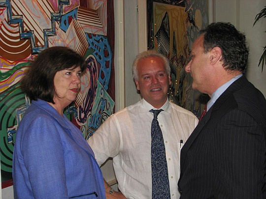 Photos by Joe Wilhelm Jr. - Attorneys Denise Watson and Homer Bliss and County Judge Gary Flower.