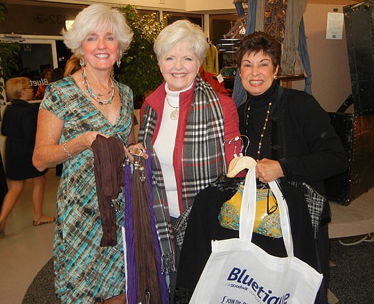 Photos by Karen Brune Mathis - Moby Lotzia, Colleen Foy and Chrissy Smith shopped and browsed at the Bluetique reception. The designer Goodwill store is at the Tournament Plaza in Ponte Vedra Beach.