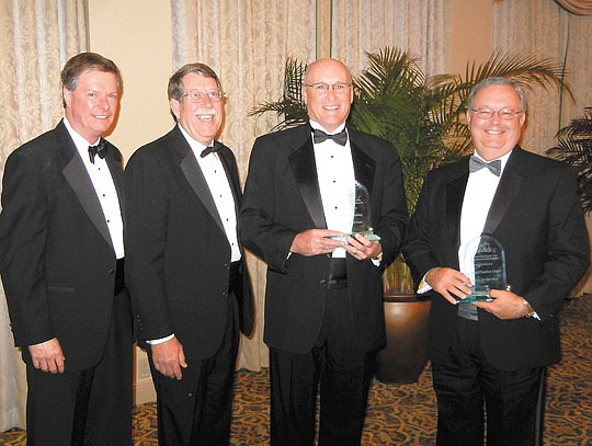 Photos by Karen Brune Mathis - Charles Sorenson, winner of the chapter's "Civility Award," with chapter President Jake Schickel and the "Jurist of the Year" award winners County Judges Russell Healey and Charles Cofer.