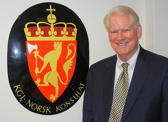 Photo by Karen Brune Mathis - Holland &amp; Knight Partner George Gabel holds a long list of honors and distinctions, including the position as Honorary Norwegian Consul for Northeast Florida. The shield is on the wall outside his office in the