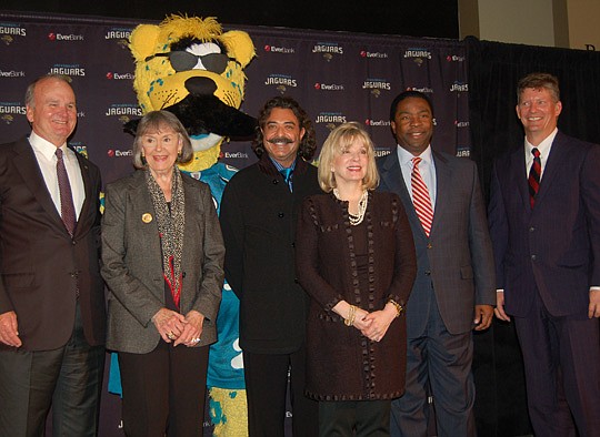 Photos by Max Marbut - From left, Jacksonville Jaguars principal owners Wayne and Delores Barr Weaver, Jaguars buyers Shahid and Ann Khan, Mayor Alvin Brown and City Council President Stephen Joost, with Jaguars mascot Jaxson de Ville in the back.