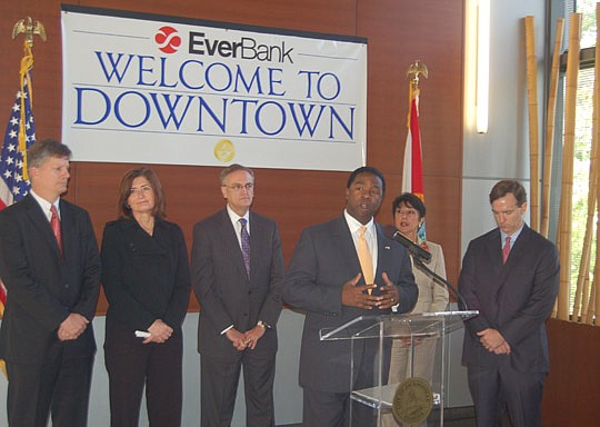 Photo by Max Marbut - Mayor Alvin Brown (at podium) was joined at the EverBank announcement Monday by (from left) City Council President Stephen Joost, Downtown Vision Inc. Executive Director Terry Lorince, JAX Chamber Chair Hugh Greene, EverBank Cent...