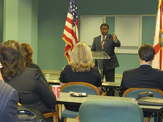 Photo by David Chapman - Mayor Alvin Brown (standing) spoke to members of the third class of the Jacksonville Political Leadership Institute Wednesday at City Hall.