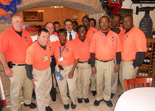 Eddie and Chuck Farah (in second row) with the Downtown Ambassadors.