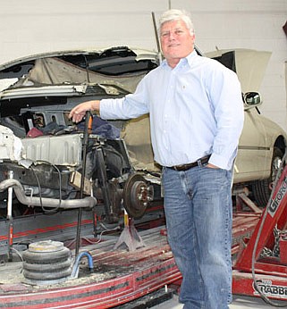 Photos by Joe Wilhelm Jr. - John "Bud Jr." Sikes III, owner of the Sikes & Stowe Inc. Downtown Collision repair shop at 625 W. Monroe St. The business has operated at a few different sites, but all have been Downtown during the 85 years it has been in...