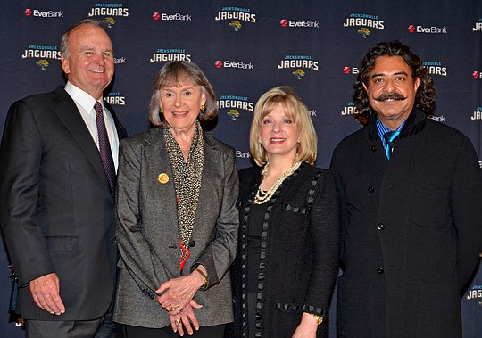 Jacksonville Jaguars sellers Wayne and Delores Barr Weaver and new owners Ann and Shahid Khan at Khan's first meeting with media in December in Jacksonville. The sale was completed Wednesday.