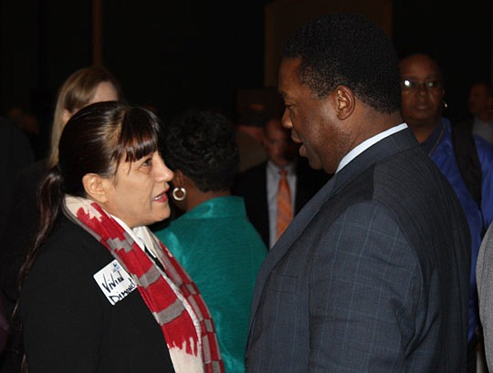 Photos by Joe Wilhelm Jr. - Vivian Dimond and Mayor Alvin Brown talk during a break at the forum.
