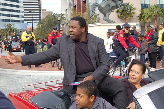 Photos by Max Marbut - Mayor Alvin Brown with son Joshua and wife, Santhea. Brown led the annual Martin Luther King Jr. Day Parade Downtown from the Jacksonville Branch of the Federal Reserve Bank of Atlanta to EverBank Field.