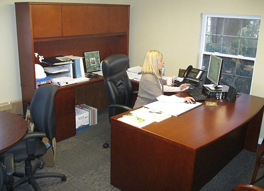 Photo by David Chapman - Deisler has been with the organization since September and says she spends the first part of her day catching up on emails and telephone calls.