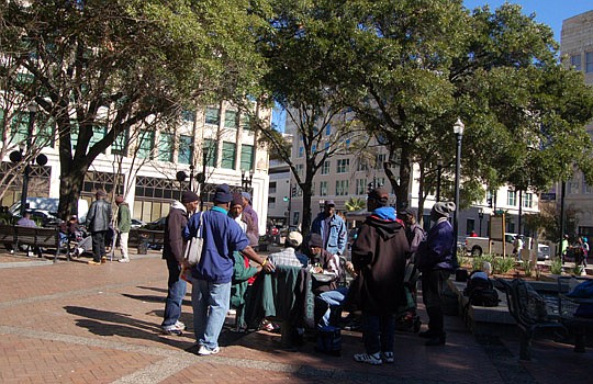 Photo by Max Marbut - The possible removal of tables and seats at Downtown's central green space is an option being considered by the City Council Ad Hoc Committee on Hemming Plaza.