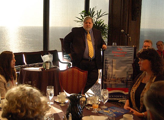 Photos by Max Marbut - Political consultant Bruce Barcelo conducted a short opinion survey Friday when the Downtown Council of JAX Chamber met at The University Club in Riverplace Tower on the Southbank.