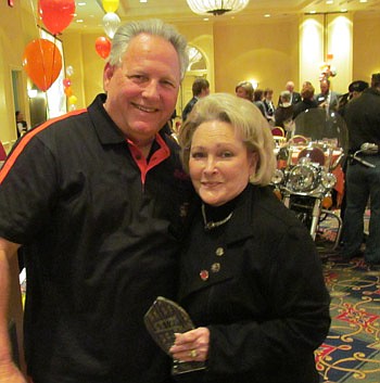 Photos by Fred Seely - Realtor of the Year Linda McMorrow with NEFAR executive Glenn East.