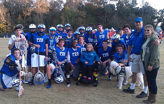 The Jacksonville Lacrosse Club's annual Community PedsCare Benefit Tournament Jan. 7-8 at Landrum Middle School in Ponte Vedra Beach raised more than $6,800 to benefit Community PedsCare. Above, Big Blue Lacrosse Club welcomed Community PedsCare patie...