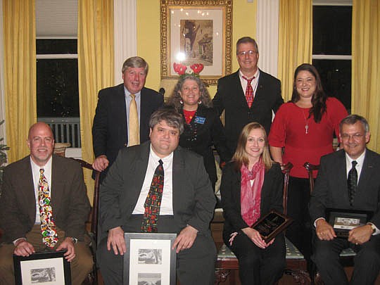 St. Johns County 2011 Pro Bono Award winners (front row from left) James Kowalski, Rusty Collins, Julie Kurtz and Howard McGillin. Back row from left, Circuit Judge Michael Traynor, St. Johns County Legal Aid Managing Attorney Megan Wall, Circuit Judg...