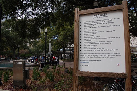 Photo by Max Marbut - The rules covering the use of Hemming Plaza are posted clearly at the park. More regulations might one day be added, based on the recommendations of the City Council Ad Hoc Committee on Hemming Plaza.