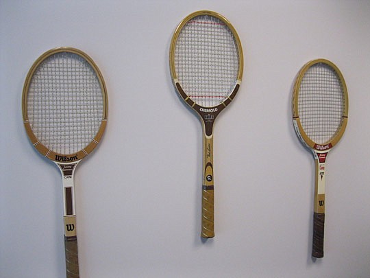 Photo by David Chapman - Perce is an avid tennis player, but doesn't use these old-school rackets. Instead, they're wall adornments. He also frequently watches the sport and his favorite player is Roger Federer.